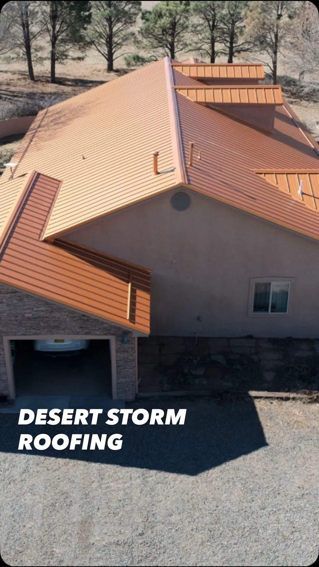 Aerial view of a finished metal roof on a New Mexico home
