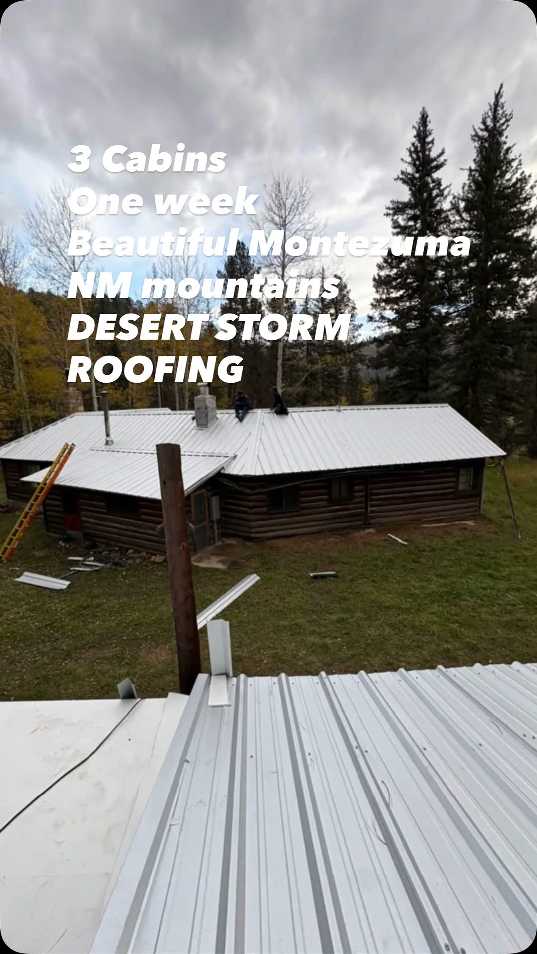 Roof work beneath a stormy sky in the Montezuma mountains of New Mexico